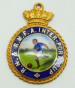 A 9ct gold and enamel RN & RMFA Inter-port Cup football medal, 9.4g