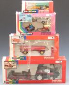 Four Britains model tractors and farm vehicle sets comprising Valmet Logging Tractor and Trailer