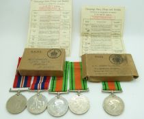 British Forces WWII boxed medals comprising Defence Medals addressed to R Smith, Mossley Hill,