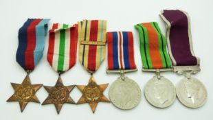 British Army WWII medals comprising 1939/1945 Star, Africa Star, Italy Star, Defence Medal, War