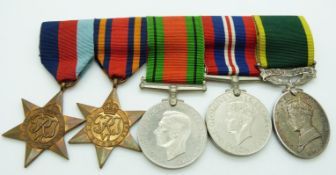 British Army WWII medals comprising 1939/1945 Star, Burma Star, Defence Medal, War Medal and