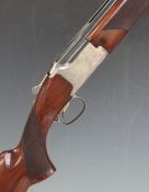 Browning 325 Grade 1 12 bore over and under shotgun with named and engraved locks, chequered semi-