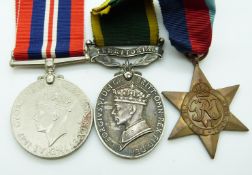 British Army WWII medals comprising 1939/1945 Star, War Medal and Territorial Efficiency Medal named
