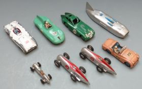 Eight Dinky Toys diecast model racing cars including Streamlined Thunderbolt Racing Car 235, 23A,