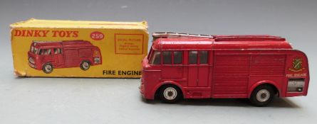 Dinky Toys diecast model Fire Engine with red body, windows, fingertip steering and four-wheel
