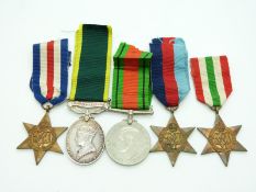 British Army WWII medals comprising 1939/1945 Star, France & Germany Star, Italy Star, Defence Medal