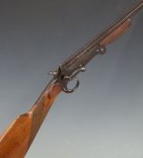 Belgian .410 folding hammer action shotgun with chequered grip and forend and 28 inch part octagonal