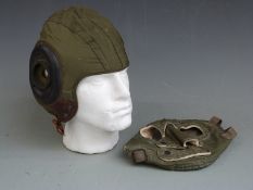 Two United States Army Air Force flying helmets, one a cold weather example