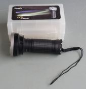 Fenix TK75 2600 lumen gun lamp/ torch, in original box.