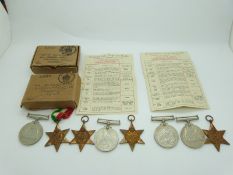 British Army WWII boxed medals comprising 1939/1945 Star, Italy Medal, Burma Star, Defence Medal and
