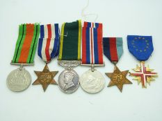 British Army WWII medals comprising 1939/1945 Star, France & Germany Star, Defence Medal, War