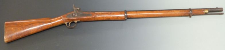 Two-band percussion hammer action gun with brass butt plate, trigger guard and mounts, stock stamped