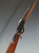 J Stevens Arms Company Favorite .22 Winchester style underlever action rifle with peep sights and 24