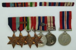Royal Navy WWII medals comprising 1939/1945 Star, Burma Star with clasp for Pacific, Italy Star,