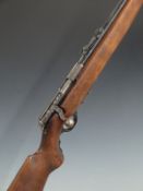 Mossberg .22 bolt action rifle with semi-pistol grip, adjustable sights and 23 inch barrel