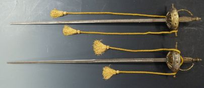 Pair of ceremonial swords with brass handle and guard, blade length 83cm