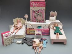 A collection of Sindy dolls, outfits and accessories including Wardrobe, Sideboard, Super Sound etc,