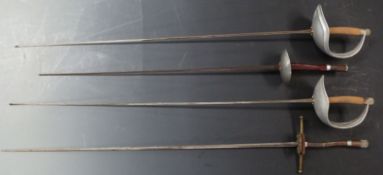 A pair of French epeés, one impressed L Paul, blade length 88cm together with two further