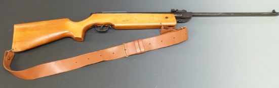 Haenel model 303 .22 air rifle with semi-pistol grip, adjustable rear sight, safety catch, scope