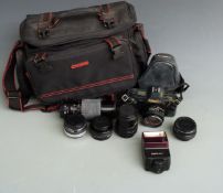 Canon T70 SLR camera with 50mm 1:1.8 and 35-70mm 1:3.5-4.5 lenses, Sigma 70-210 f 4.5 lens, three