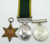 British Army WWII medals comprising 1939/1945 Star, War Medal and Territorial Efficiency Medal named