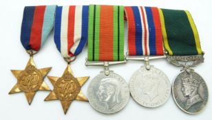 British Army WWII medals comprising 1939/1945 Star, France & Germany Star, Defence Medal, War