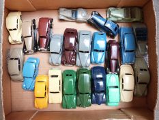 Twenty-three Dinky Toys diecast model cars including Chrysler, Vauxhall, Daimler, Vanguard, Austin