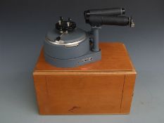 Griffin and George Limited cased spectrometer on slide out wooden panel, length 35cm