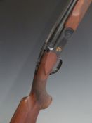 Cased Renato Gamba Victory 12 bore over and under ejector shotgun with named lock, chequered semi-