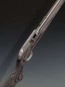 Marlin model 60SS .22 LR bolt action rifle with show wood stock, semi-pistol grip, sling mounts,