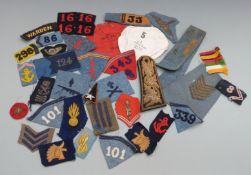 A small collection of military cloth insignia etc