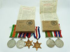 British Army WWII boxed medals comprising 1939/1945 Star, France & Germany Star, Defence Medal and