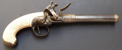 Decorative flintlock hammer action pistol with engraved bone grips and 6 inch barrel, overall length
