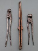 Three various bullet moulds, one to make 15 different ball sizes.