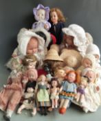 Twenty-seven various dolls including composite headed and bodied examples, largest 65cm tall.