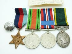 British Army WWII medals comprising 1939/1945 Star, Defence Medal, War Medal and Efficiency Medal