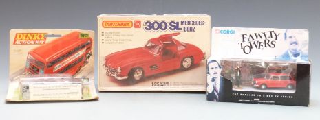 Three various model vehicles and vehicle sets comprising Corgi Fawlty Towers Austin 1300 Estate &
