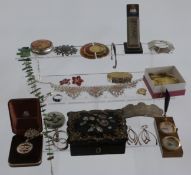 A collection of jewellery including brooches, silver Taxco Mexican pendant, Potens desk stand, white