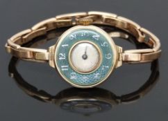 Wilsdorf & Davis 9ct gold watch with blued hands, silver dial, silver inlaid Arabic numerals to