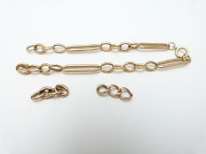 A 9ct rose gold bracelet made up of elongated links, 8.8g