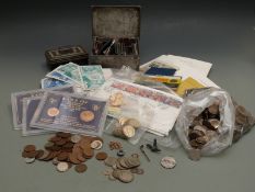 An amateur coin collection comprising presentation coin packs, sundry overseas and UK coins 19thC