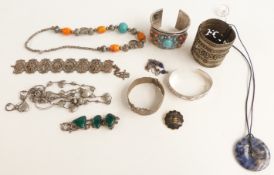 A silver bracelet, sodalite pendant, bangles, silver necklace etc