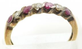 A 9ct gold ring set with rubies and alternating cubic zirconia, 1.9g, size O