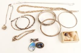Two Victorian brooches set with butterfly wing, a silver ring set with Blue John, silver bangles,