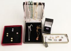 Two pearl necklaces, an ivory necklace, glass necklaces and pearl earrings