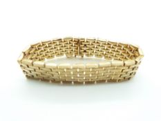 A 9ct gold bracelet made up of rectangular sections, 39.8g