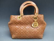 Christian Dior tan leather cannage pattern 'Lady Dior' bag with gold tone hardware, Dior charm and