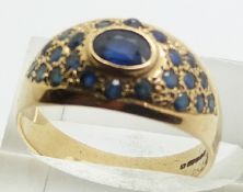 A 9ct gold ring set with sapphires, 3.4g, size Q