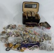 A collection of costume jewellery including beads, brooches, paste necklaces, WBS necklace etc