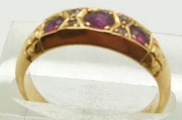 An 18ct gold ring set with rubies and diamonds, Chester 1911, 4.5g, size N